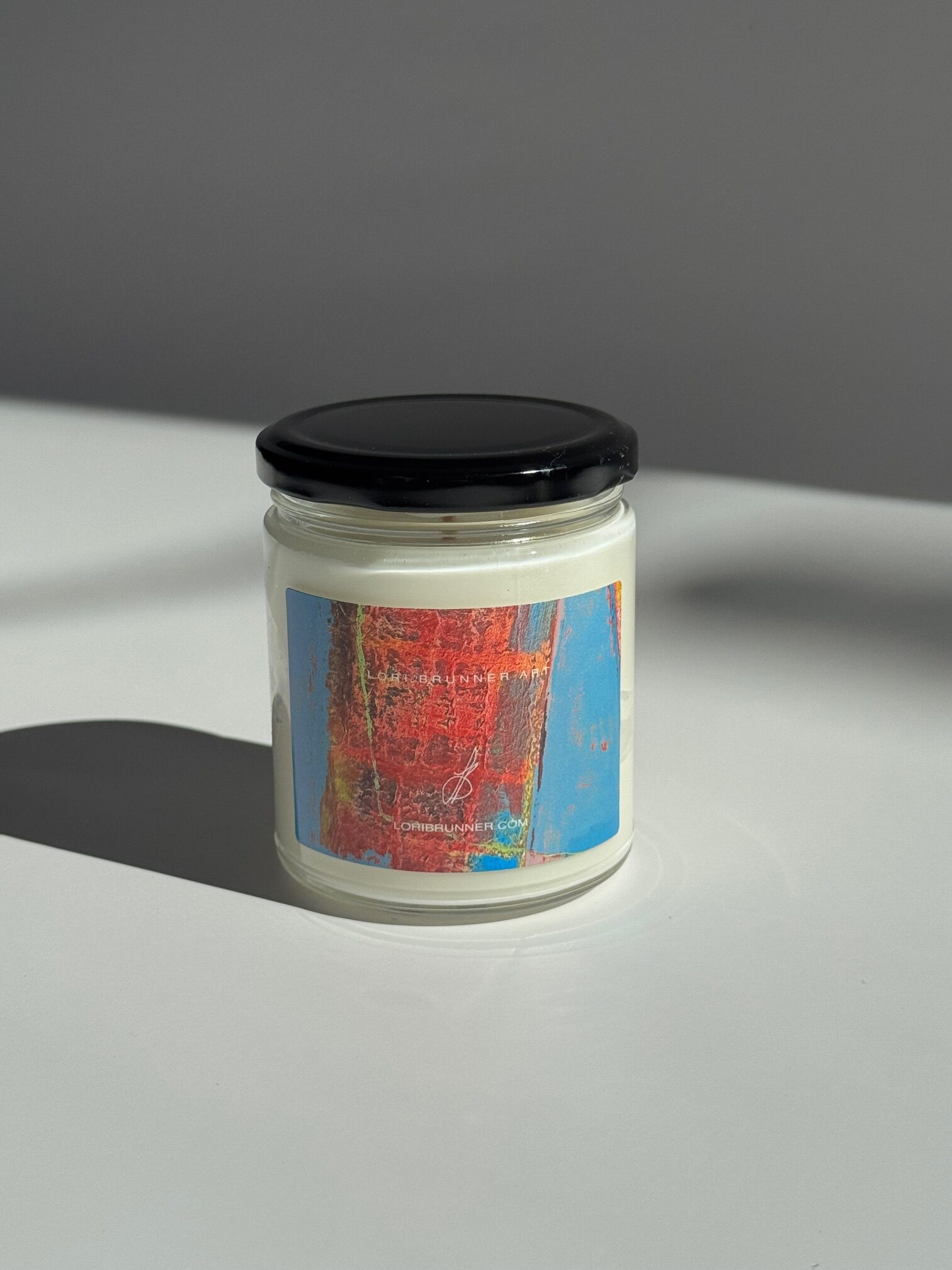 Scented candles. Artful living for the holidays. Elevated. Modern. Chic. Artist-designed holiday products and artwork by Lori Brunner Art.