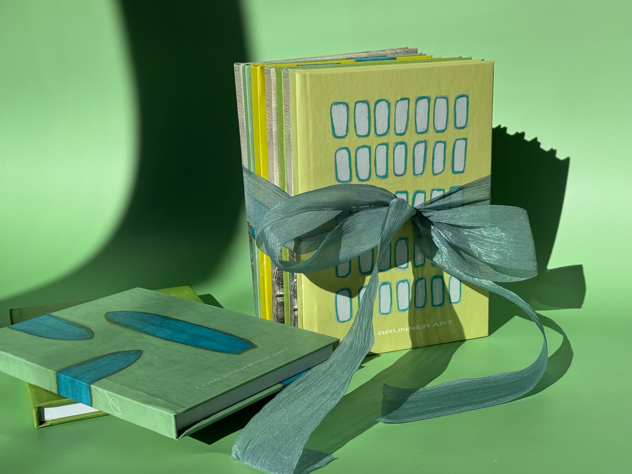 Blank journals with artful covers. Artful living for the holidays. Elevated. Modern. Chic. Artist-designed holiday products and artwork by Lori Brunner Art.